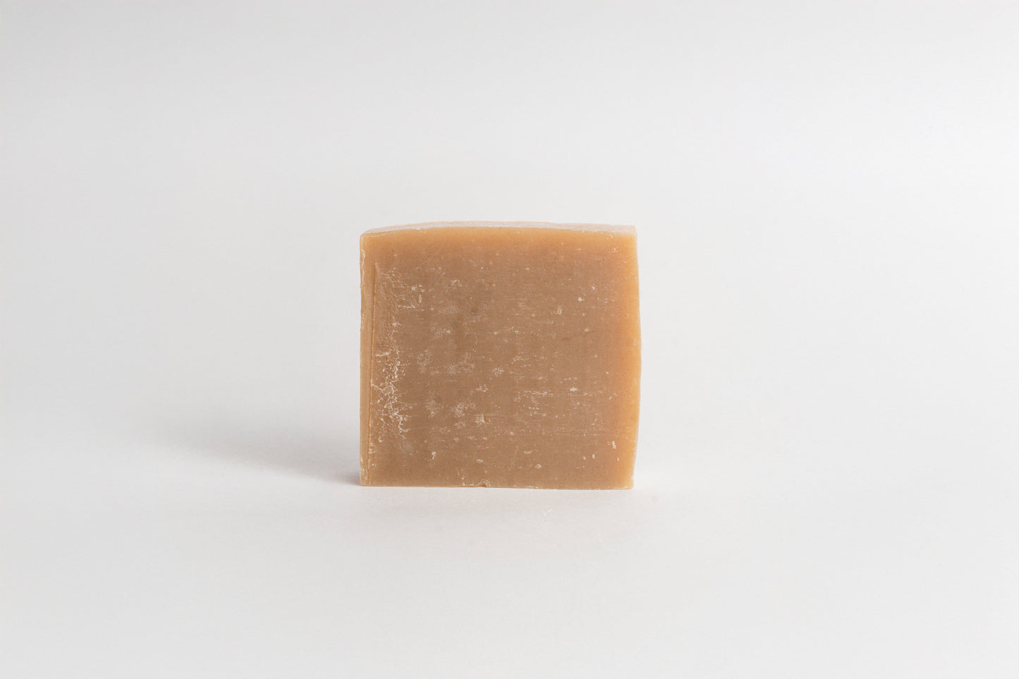 Handmade natural soap bar with RELOR NATURALS packaging for soft and healthy skin
