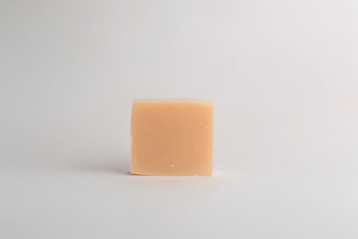 Handmade natural soap bar with RELOR NATURALS packaging for soft and healthy skin