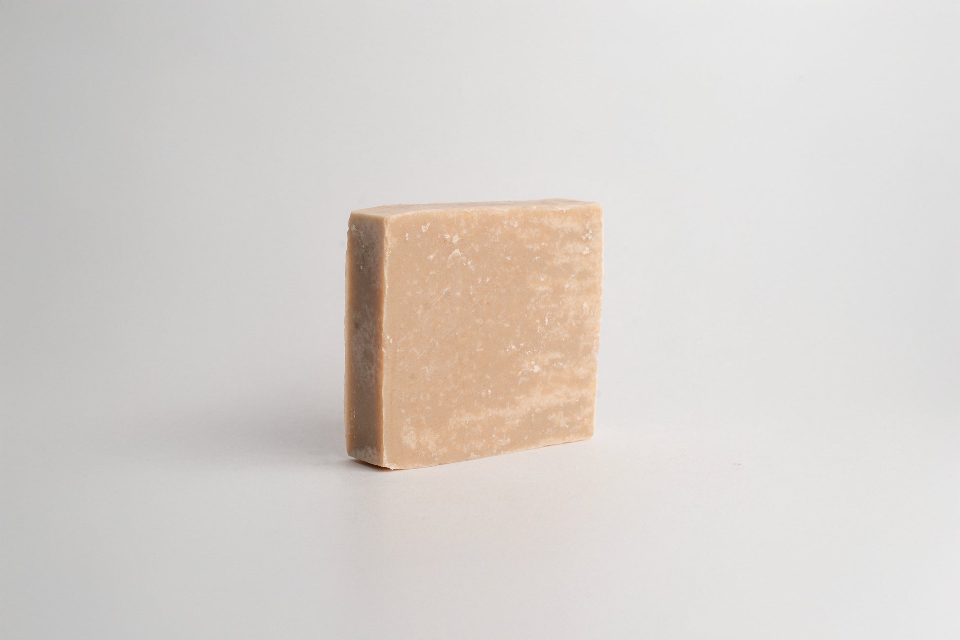 Handmade natural soap bar with RELOR NATURALS packaging for soft and healthy skin